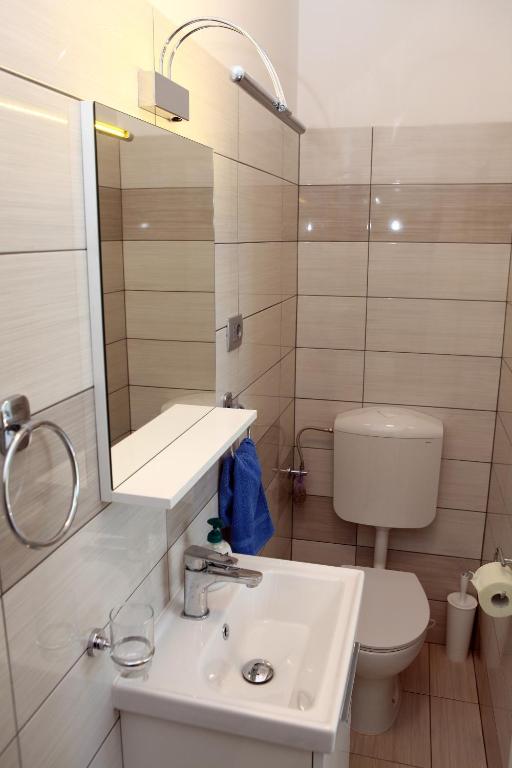 Bathroom with sink and mirror